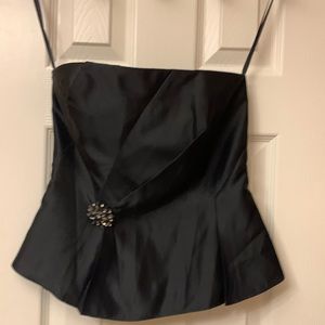 White House black market. Strapless satin top with rhinestone pin.
